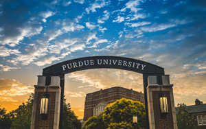 Photo of the top of the Purdue Gateway at sunset
