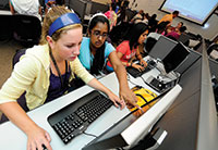 Female students working in computer lab