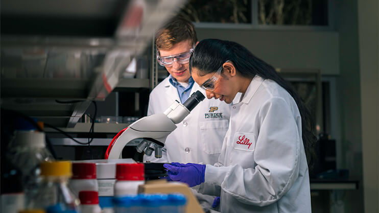 Purdue students working in a lab.