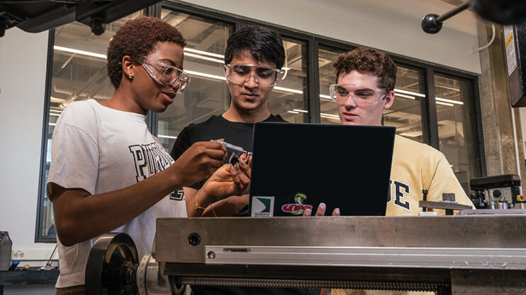 Students learning in a workshop lab.