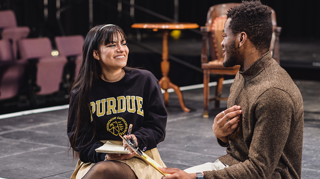 Students practice for a theater performance