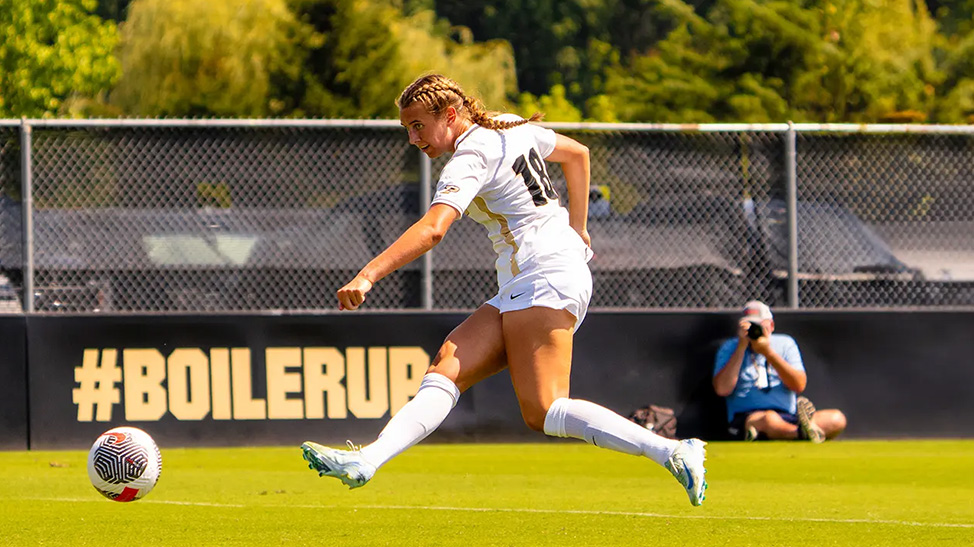 Abigail Roy playing soccer