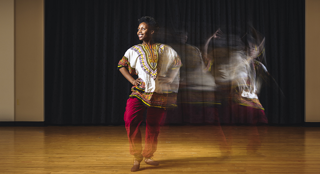 A student performs in the Jahari Dance Troupe