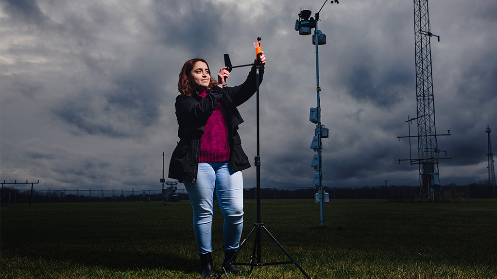 Valeria in field measuring storm