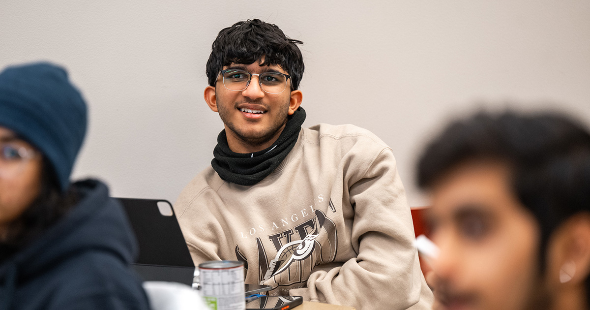 student smiling in class