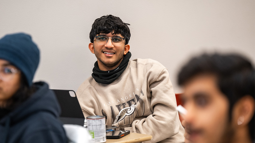 student smiling in class