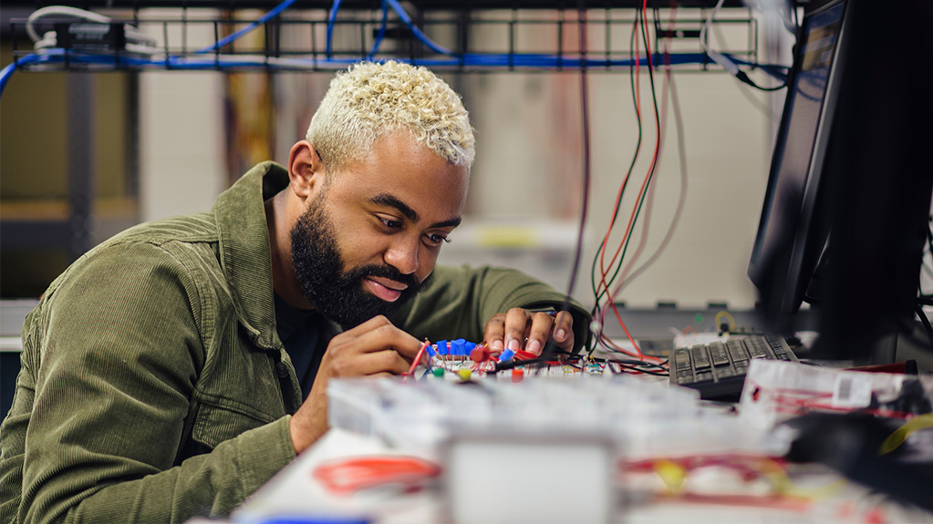 student working on electrical