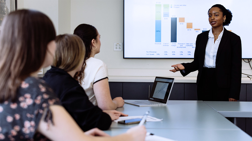 A woman gives a sales presentation