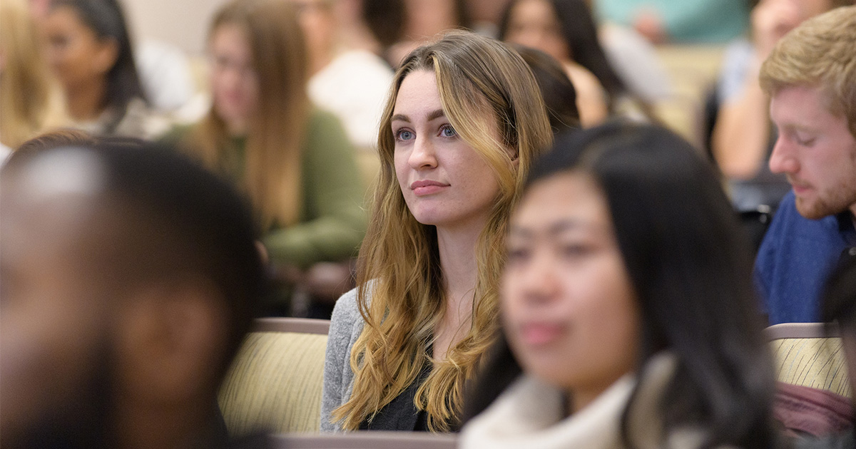 student listening in a lecture