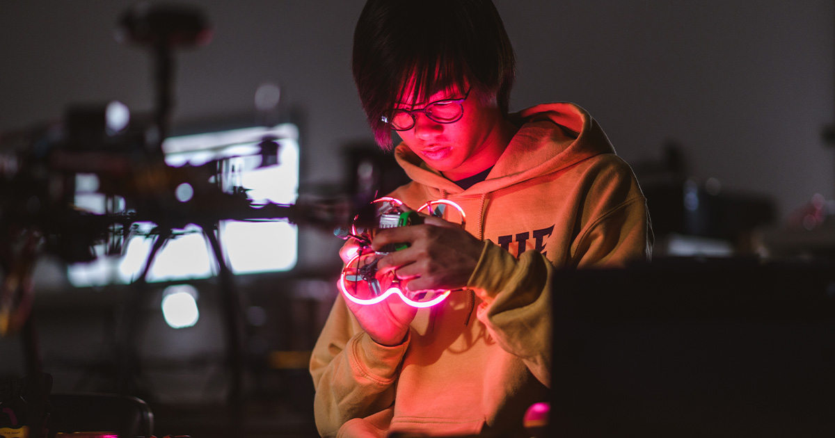 student working on robot