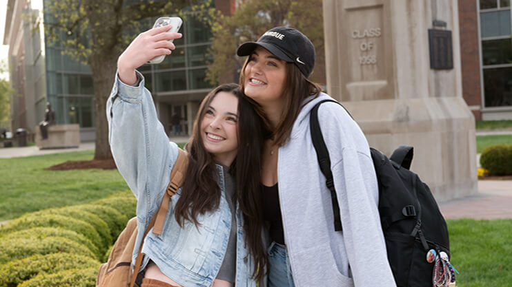 Students taking a selfie.