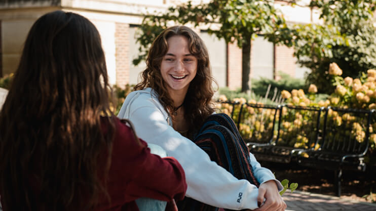 Students talking outside.