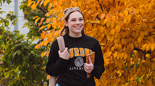 Student walking on campus.