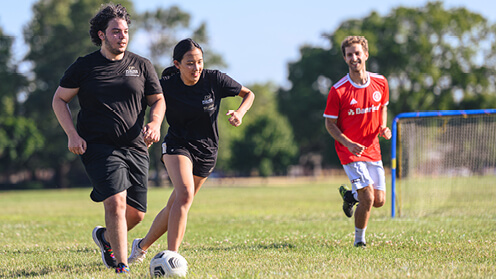 Students playing soccer.
