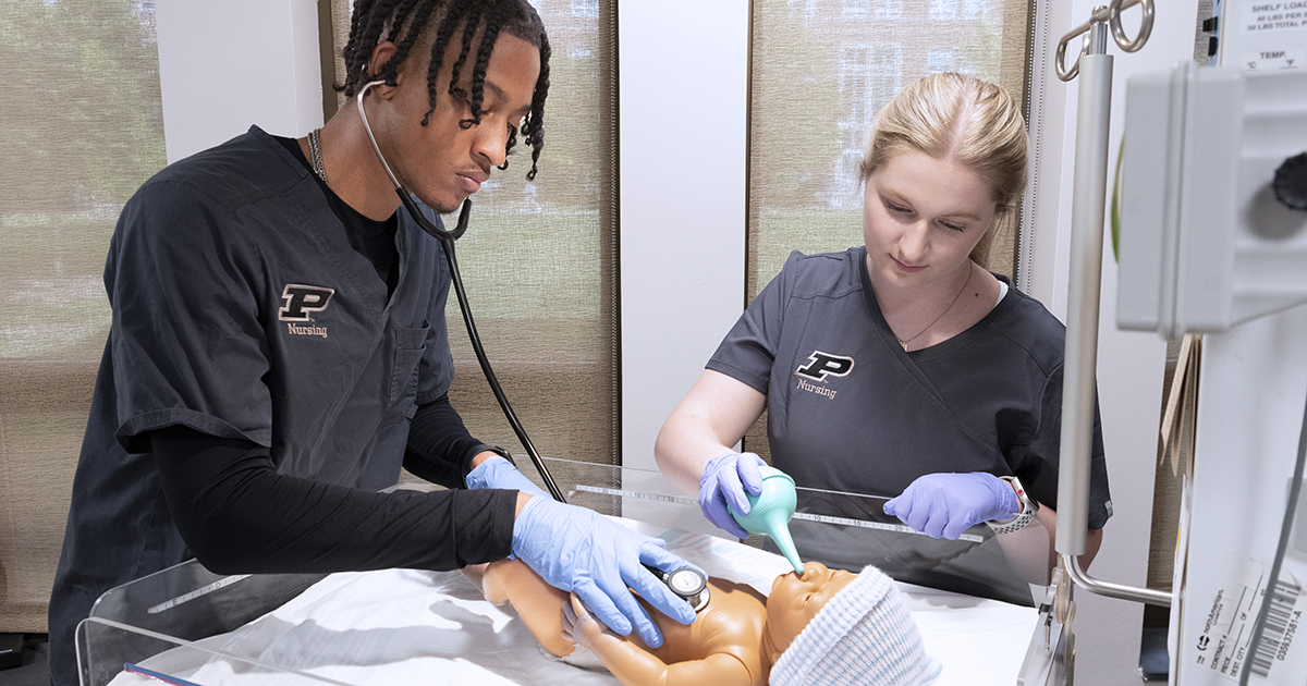 Nursing VR training on an infant model at Johnson Skills Lab