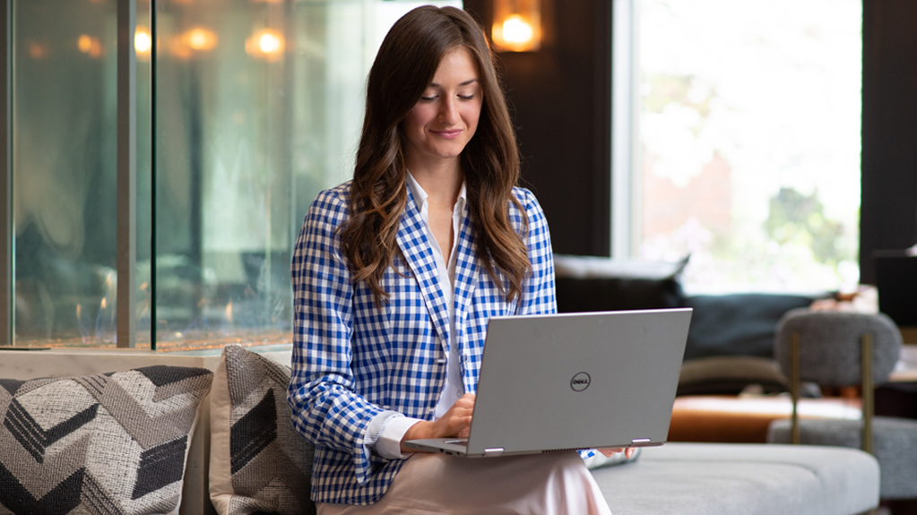 A student works on a laptop