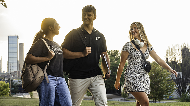 Three Purdue students walk together outside in Indianapolis