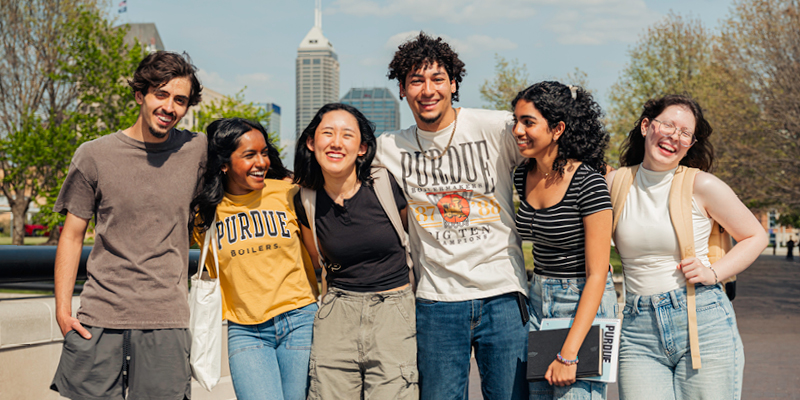 Group of students smiling at camera.